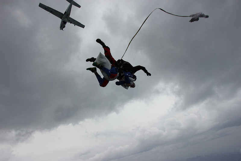 Illustration for article titled Pure Nerd Insanity: Two Men Skydiving with a Girly Hug Pillow